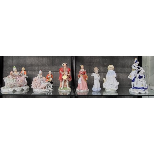 209 - A pair of Alfretto bisque porcelain figures of Henry VIII and Anne Boleyn 23cm and 21.5cm high, porc... 