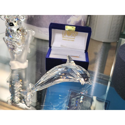 212 - Swarovski cat glass ornaments including Dolphin Koala Bear, pair of Swans, fish, some with boxes.  (... 