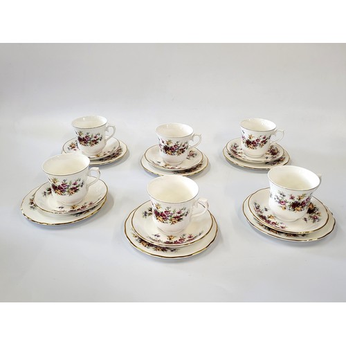 218 - Queen Anne porcelain cup, saucers, and side plates. (18)