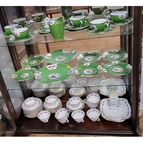 224 - A Czechoslovakian 'Union' green ground part tea set and a Tuscan part tea set. (56)