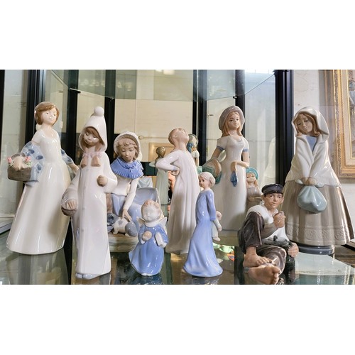 252 - Three Lladro figures of girls 20cm to 26cm, and six figures by various makers including Nao girl wit... 