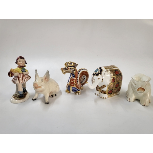 263 - Royal Crown Derby Elephant and Dragon, a pair of Beswick white pigs, and a German porcelain figure o... 