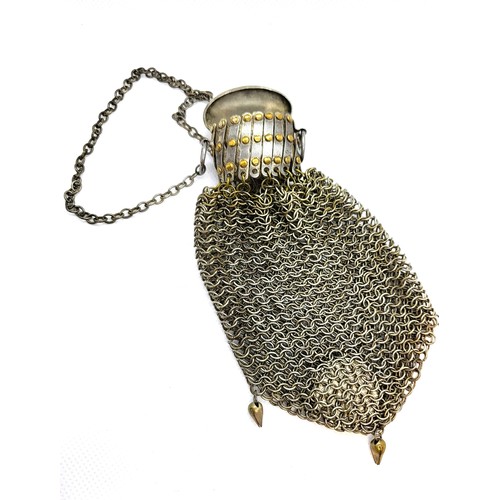 267 - A chain purse with concertina top and hinged lid with foliate design, a pair of pince nez with gold ... 