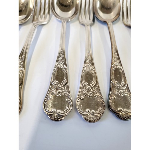 273 - Twelve pairs of dessert spoons and forks with foliate design. Ercuis with centaur stamp. 1227gms (24... 