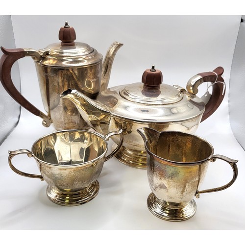 285 - A Mappin & Webb silver tea set including a coffee pot, a teapot, sugar bowl, milk jug, and sugar ton... 