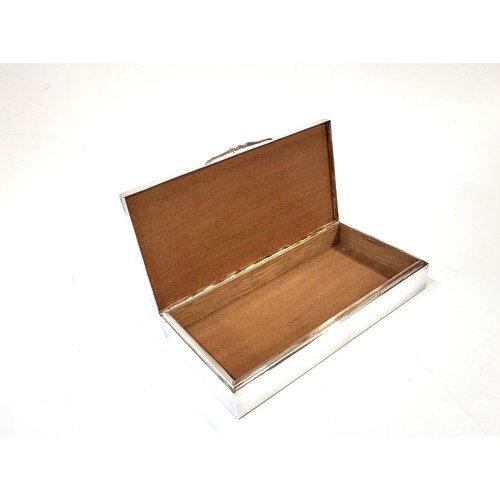 290 - A cigarette box (marks indistinguishable inside lid and on base) with engine turned lid,  wood lined... 