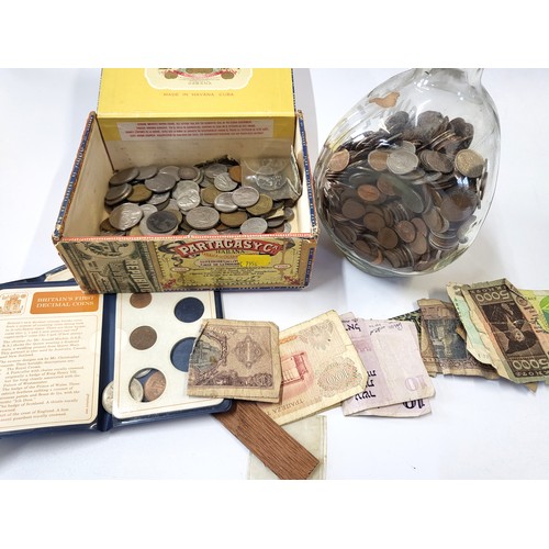 300 - A collection of coins and notes