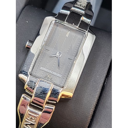 431 - A gentleman's Hugo Boss dress watch in original presentation box and sleeve, and a ladies Emporio Ar... 