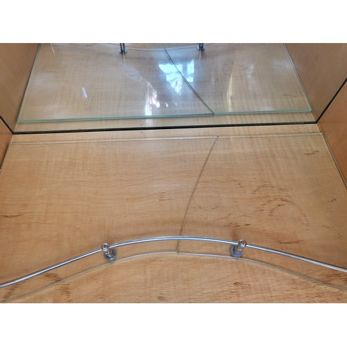 27 - A two-door cocktail mirror-back cabinet (with broken glass shelf),  over two short drawers supported... 