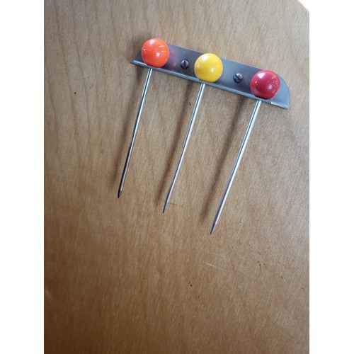 27 - A two-door cocktail mirror-back cabinet (with broken glass shelf),  over two short drawers supported... 