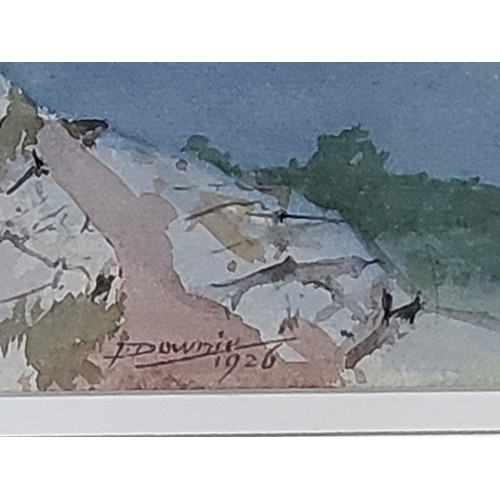 85 - Downie 1926 signed watercolour depicting a view over a seaside inlet bay. 46cm x 58cm including fram... 