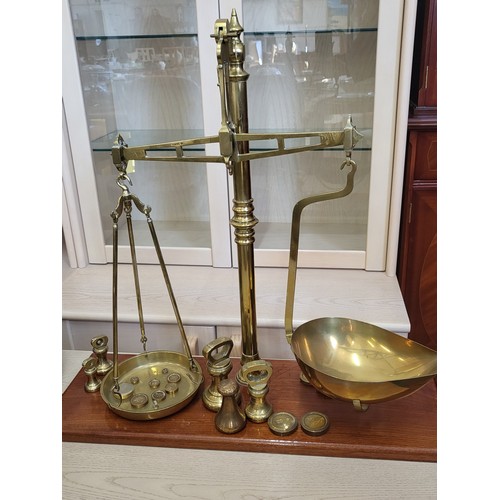 90 - A set of Victorian brass scales and weights 53cm x 61cm x 21cm.
