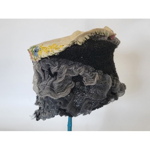 96 - A ladies hat hand made by the artist R. Conway-Jones. The hat stand is not included in the lot.