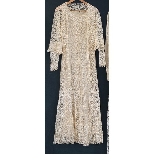 99 - A 1920's Flapper style, drop waist, lace wedding dress. Long sleeve with mid arm detail (Damage unde... 