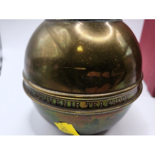 101 - A round brass tea caddy produced as a souvenir of the British Empire Exhibition by Lipton's tea comp... 