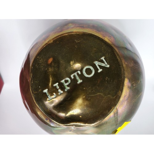 101 - A round brass tea caddy produced as a souvenir of the British Empire Exhibition by Lipton's tea comp... 