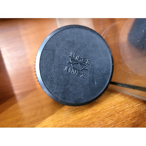 102 - A collection of four various camera lenses, a Prinzgology No 49164 with camera case, Bell & Howell s... 