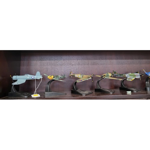 110 - Twelve diecast WWII aircraft including Junkers JU 87.B, Messerschmitt 109.E, and Supermarine Spitfir... 