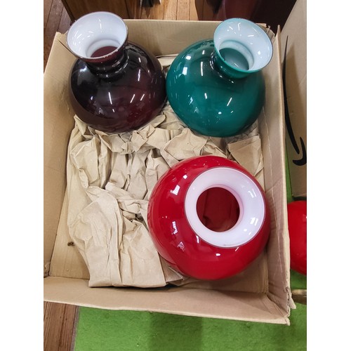 44 - Two coach lanterns H:45cm, brass double wall sconce with shades H:29cm W:33cm and three glass colour... 