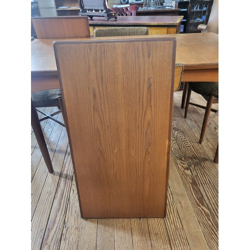 2 - A 1960's G-Plan Fresco dining table with two extendable leaves 72 x 152 x 89cm (two extendable leave... 