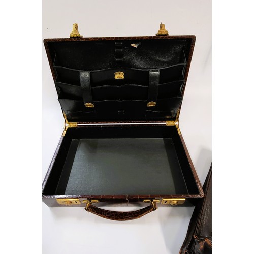 137 - A crocodile skin GFR attaché case circa 1880 36 x 24cm,  and a leather briefcase 42 x 34cm. (2)
