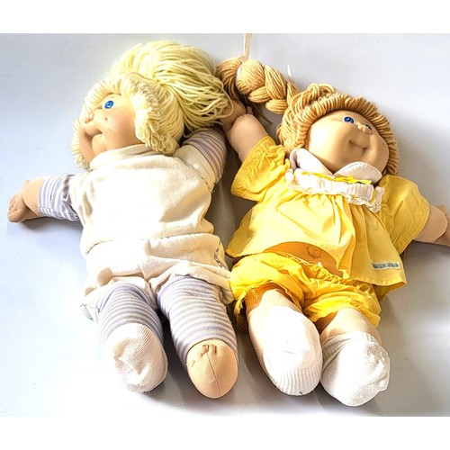 144 - A pair of 1980's Cabbage Patch Kid dolls.