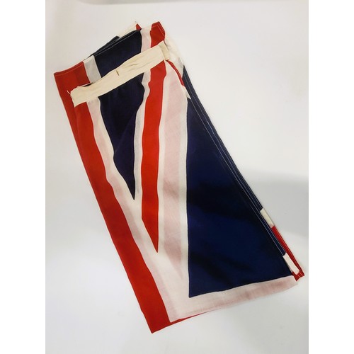 149 - A Royal Navy Union Jack flag dated 1982 64cm x 140cm.