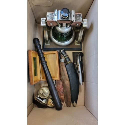 152 - An eclectic assortment including four lighters, three ornamental knives and sheaths, a 1970 musical ... 