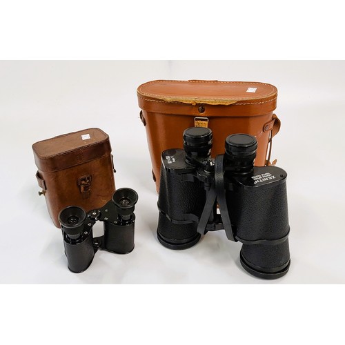 162 - Two pairs of binoculars: Zenith 10 x 50 and vintage Ross Prism x 8. (2)