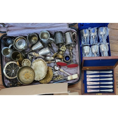 177 - A large quantity of brass, pewter, and EPNS including tankards, cutlery, bowls, boxed knives, and bo... 