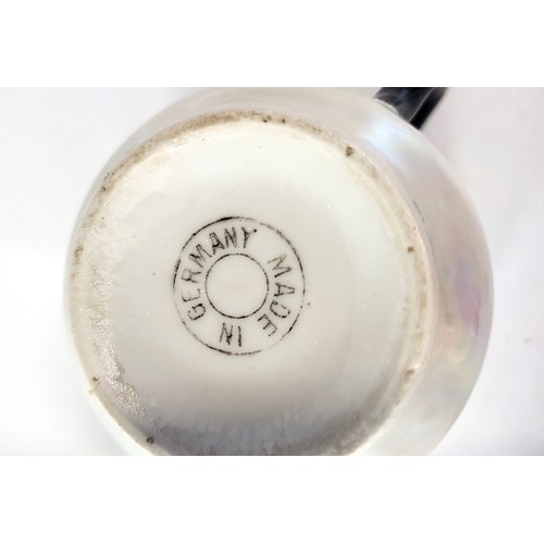 198 - A German opalescent coffee set comprising of six cups and seven saucers, coffee pot, cream jug and l... 