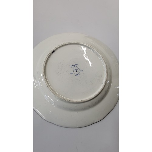 215 - A pair of Sevres plates circa 1773. 24cm diameter. (2)