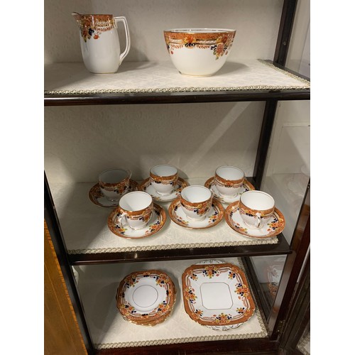 221 - A Melba part tea service with six cups and saucers, and a Foley part tea service with five cups and ... 