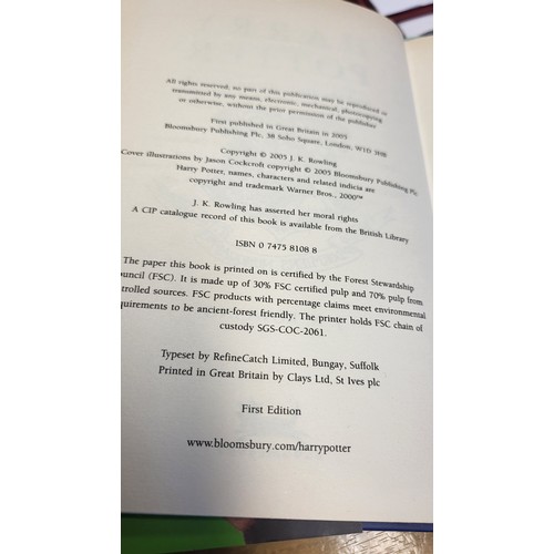 182 - Five Harry Potter books including paperback The Chamber of Secrets, and four first edition hardbacks... 