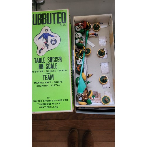157 - Subbuteo OO scale football figures in boxes, components, three pitch cloths, and 1978 catalogue.