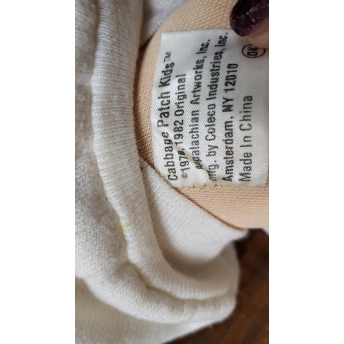 144 - A pair of 1980's Cabbage Patch Kid dolls.