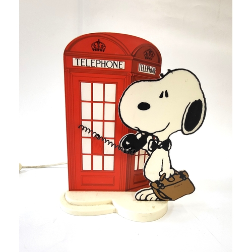 29 - A Snoopy and UK telephone box lamp, 28cm.