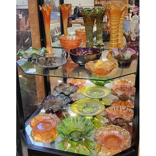 292 - Carnival glass iridescent bowls, three Jack-in-the-Pulpit vases 26.5cm, 29cm and 30cm, and purple an... 