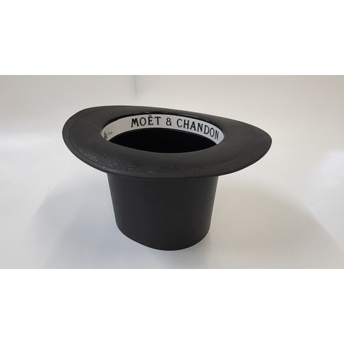 293 - A Moet & Chandon ice bucket in the form of a top hat.