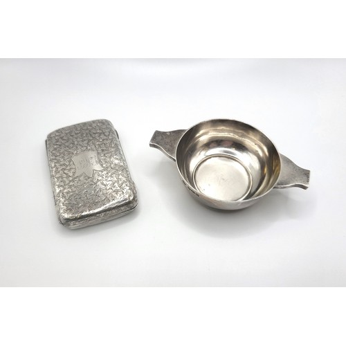 343 - A silver quaich William Hutton & Sons Ltd, Sheffield 1930 2.5cm height, 10cm width 64.1gms, and a si... 
