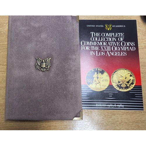 352 - A collection of commemorative coins for the XXIII Olympiad in Los Angeles in a presentation case.