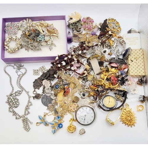 356 - Costume jewellery including brooches, cuff links, earrings, fashion watches, lockets, a base metal/ ... 