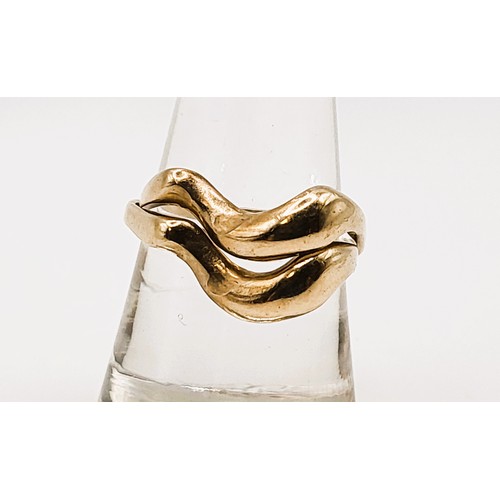 370 - A 9ct yellow gold puzzle ring 4.5gms size Q 1/2.