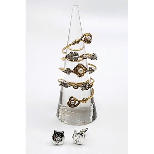 384 - A 22ct yellow gold spiral ring with paste and faux pearls. Size variable O-P. 7.4gms, and a pair of ... 