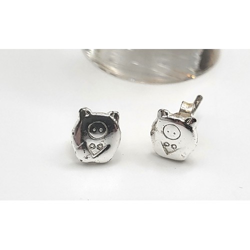 384 - A 22ct yellow gold spiral ring with paste and faux pearls. Size variable O-P. 7.4gms, and a pair of ... 