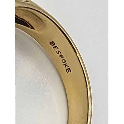 392 - An 18ct yellow gold Victorian style setting sapphire and diamond set ring. With five graduated oval ... 