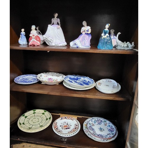 267 - Eight figurines and thirteen plates including Royal Doulton, Coalport, Lladro, Hammersley, Spode and... 