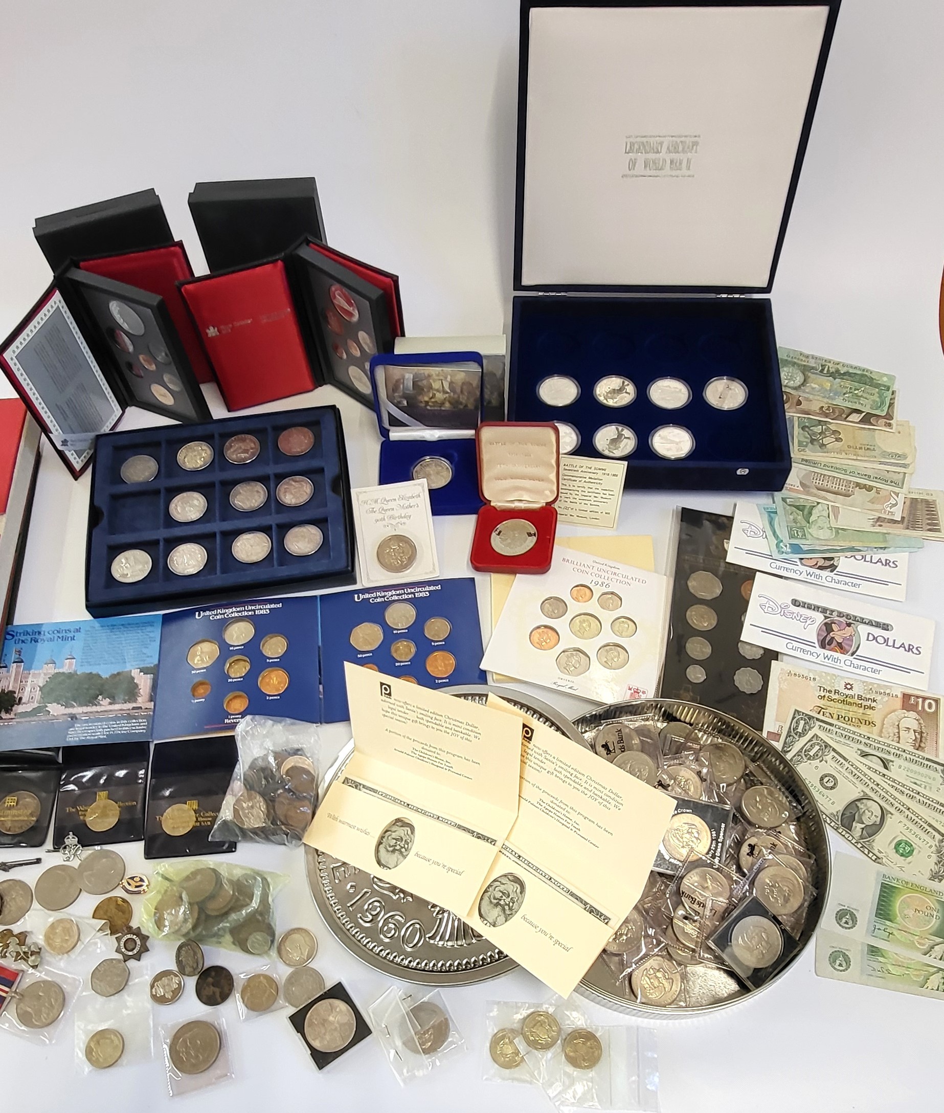 A collection of coins including an incomplete boxed set of Legendary ...