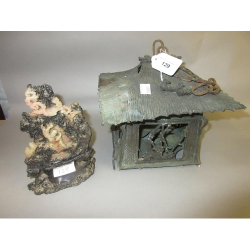 129 - Oriental cast bronze hanging lantern (at fault), and a carved soapstone figure on stand