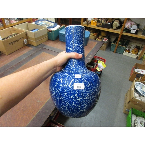 586 - Large Chinese porcelain bottle vase, all-over floral decorated in blue and white